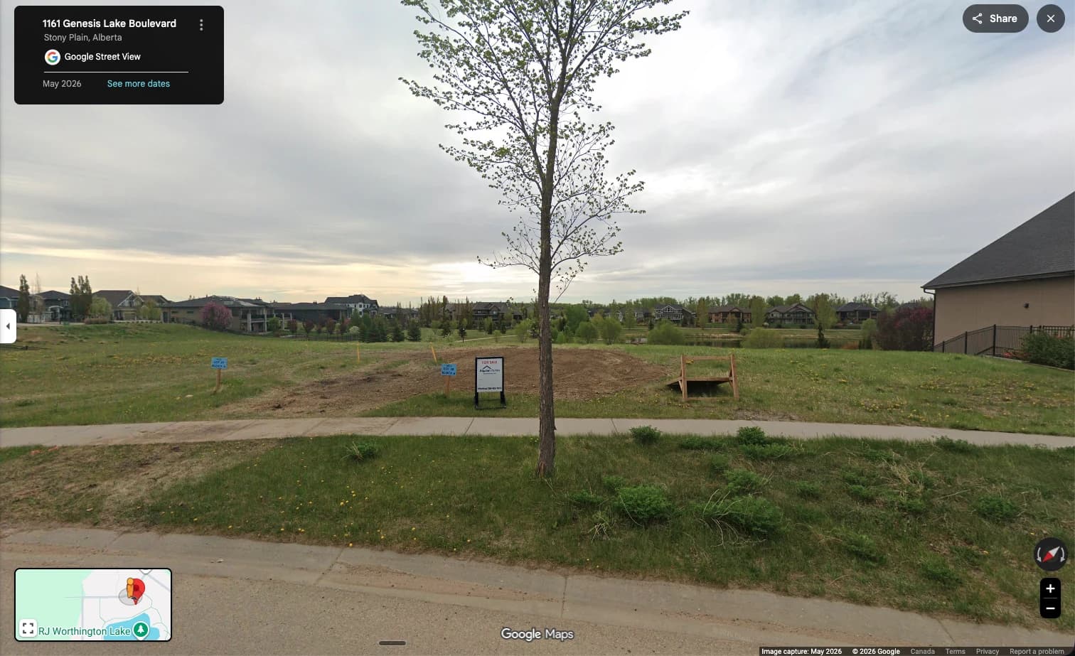 Google Street View of a for-sale lot on Genesis Lake Boulevard, opened from the community map, with the Street View panel and Google Maps attribution.
